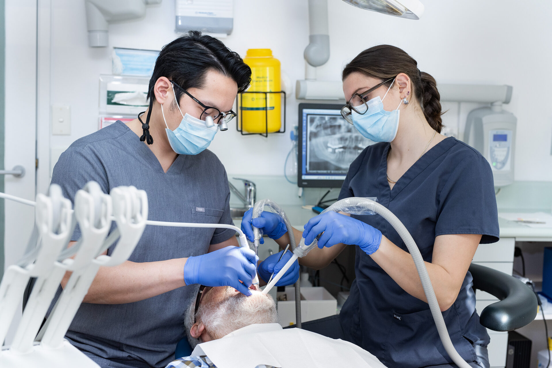 Dental hygienist East Melbourne performing professional teeth cleaning treatment