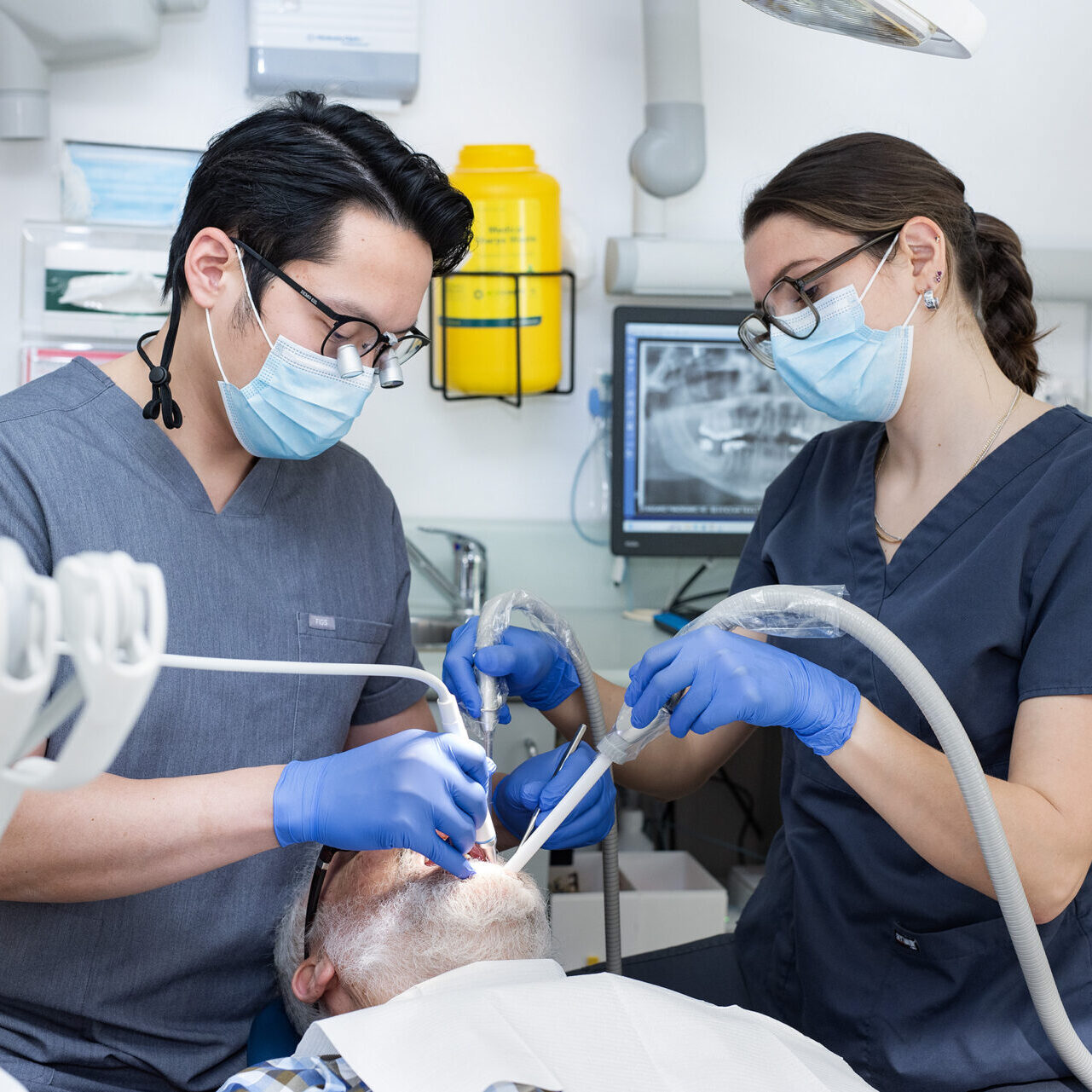 Dental hygienist East Melbourne performing professional teeth cleaning treatment
